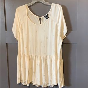 Torrid cream w/gold stars peplum top